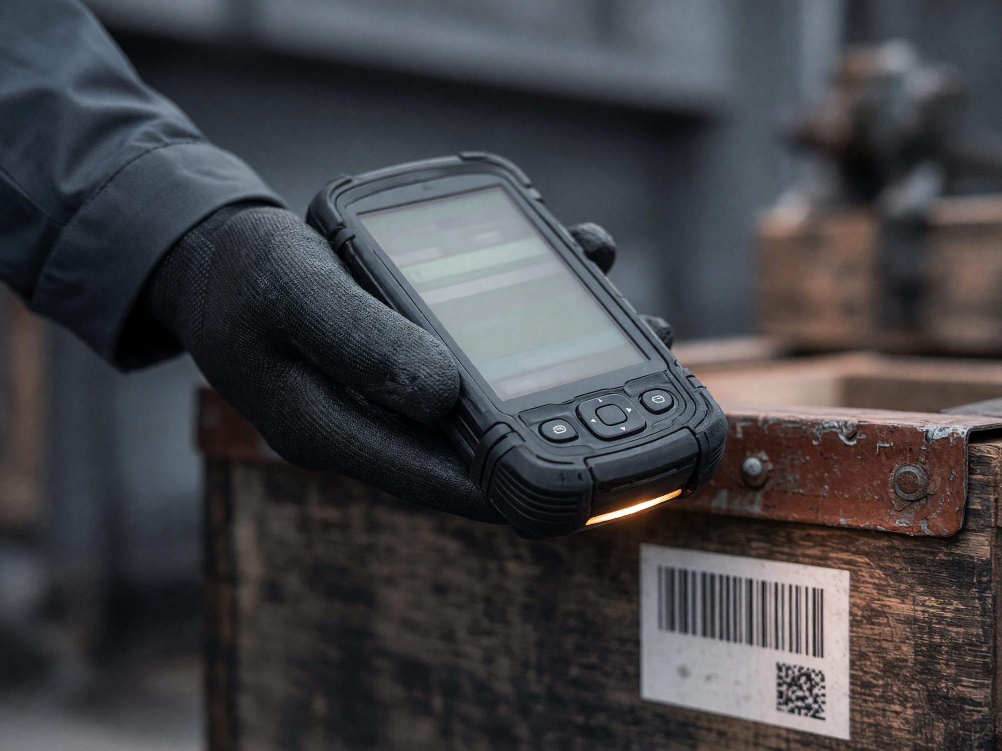 A rugged mobile computer scanning a label at the moment data enters